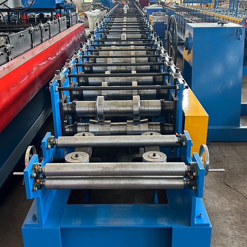 Close-up of forming rollers and shafts