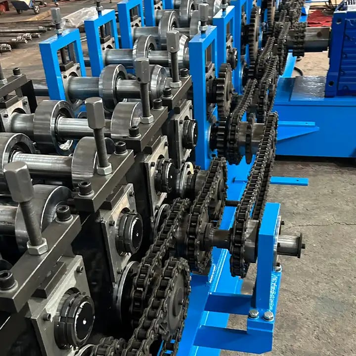 Close-up of forming rollers and shafts