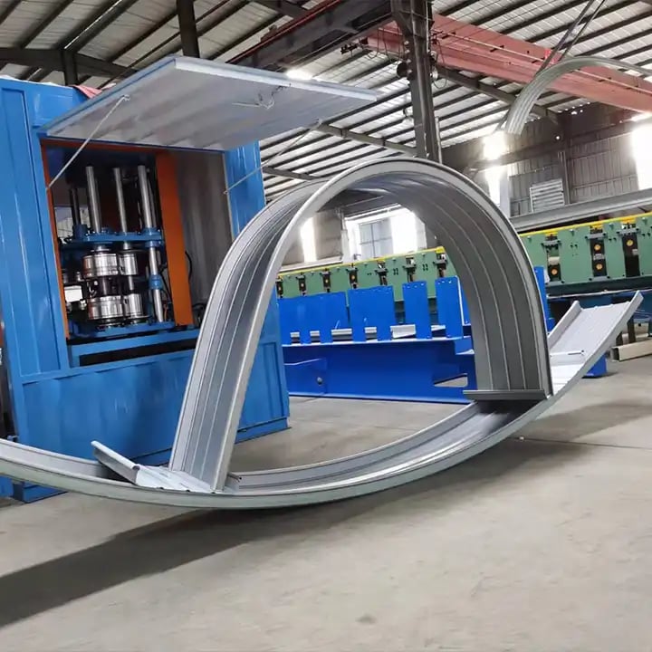 Curved metal roof panel